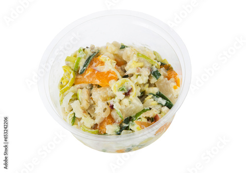 Fresh cut mixed vegetable fruit salad. Food. Packed in plastic bowl.