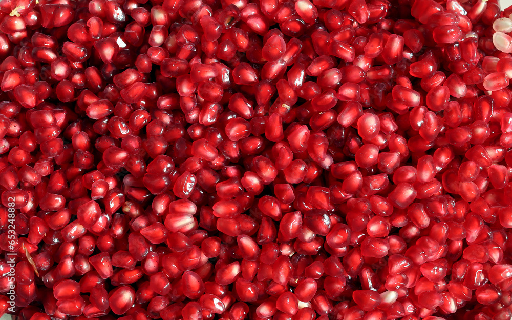 Pomegranate seeds background. Close up of pomegranate seeds. Pomegranate seeds background. Close up of pomegranate seeds.