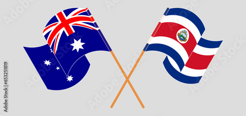 Crossed and waving flags of Australia and Costa Rica