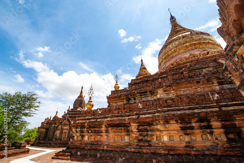 The Paya Dhammayazika in the surroundings of New Bagan, with its bell-shaped gilded dome, Myanmar, Asia photo