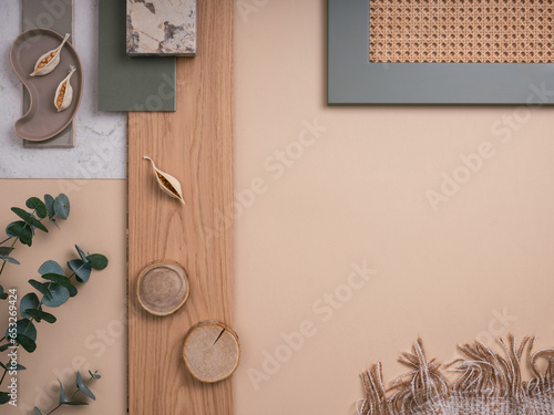Simple flat lay composition with textile and paint samples  panels and cement tiles. Stylish interior designer moodboard. Light beige and green color palette. Copy space. Template.