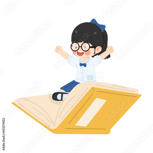 Kid girl student sitting on a book