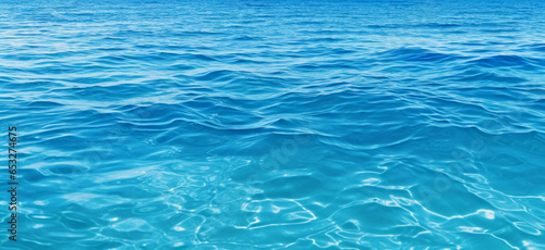 Blue water background with waves, ripples and horizon. Panorama of blue clear ocean or sea water surface. Generative AI