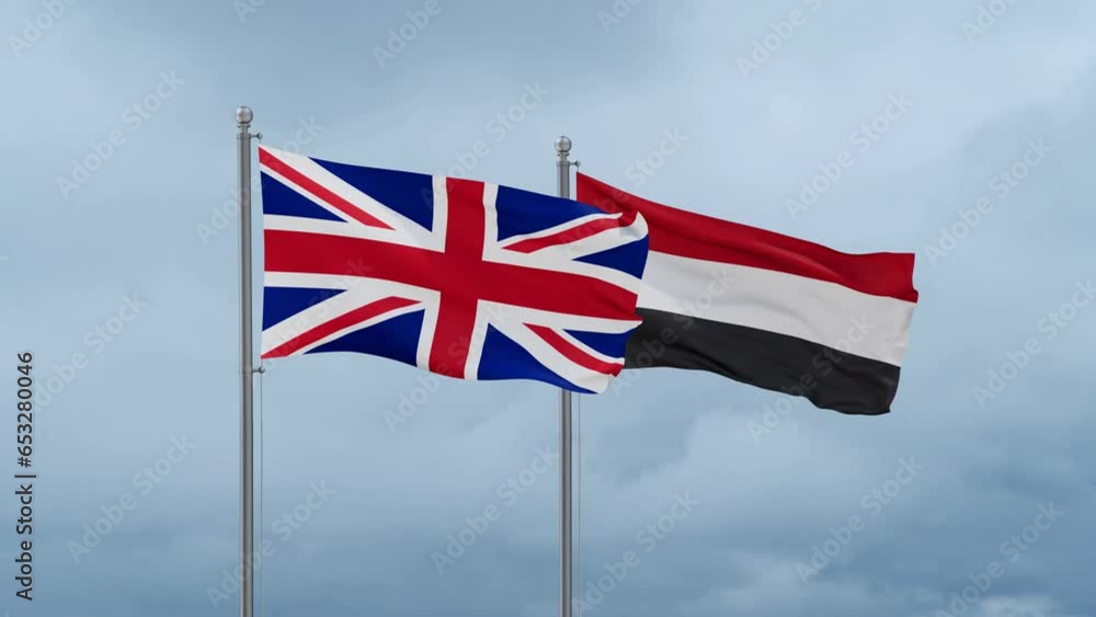 Yemen and UK United Kingdom of Great Britain flag waving together on cloudy sky, endless seamless loop, two country cooperation concept Yemen and UK United Kingdom of Great Britain flag waving together on cloudy sky, endless seamless loop, two country cooperation concept