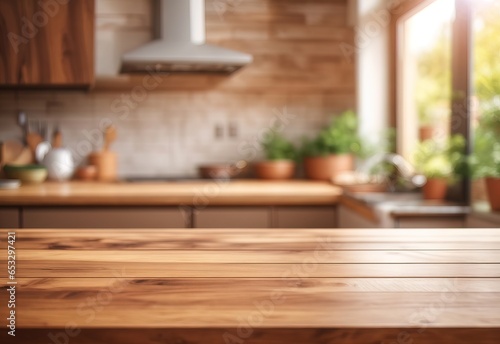 Beautiful empty brown wooden table top and blurred defocused modern kitchen interior background