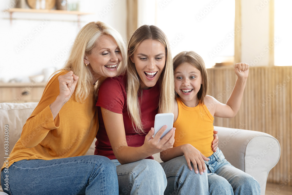 Emotional grandmother, mom and girl kid using phone at home Emotional grandmother, mom and girl kid using phone at home