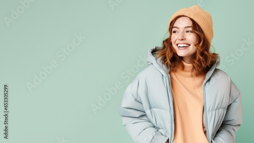 Happy brunette woman wear winter cloth isolated on pastel background