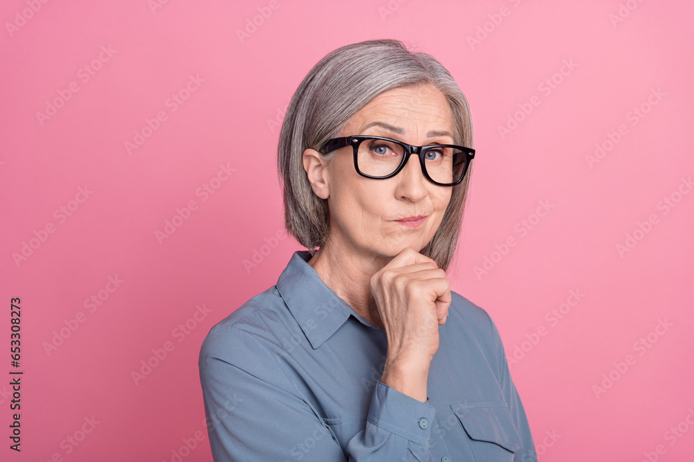 Photo of gorgeous minded lady office manager arm touch face solving problem dilemma isolated on pink color background