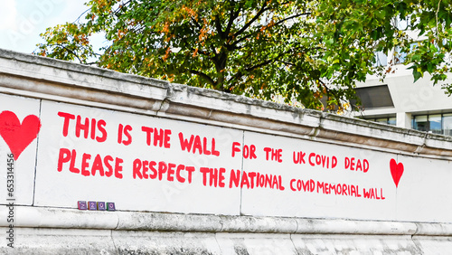 London, UK, 15 August 2023:The National Covid Memorial Wall on Southbank, is covered in thousands of hand drawn hearts, in memory of all the lives lost in the United Kingdom to Covid-19 pandemic
