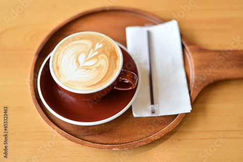 high angle view of coffee cup on wood grain table Drinking Concept: Hot Coffee, Latte, Espresso, Cappuccino