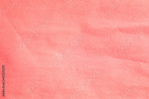 Old vintage soft red paper surface texture close up