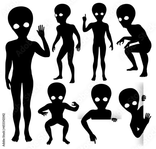 Vector silhouettes of little grey aliens