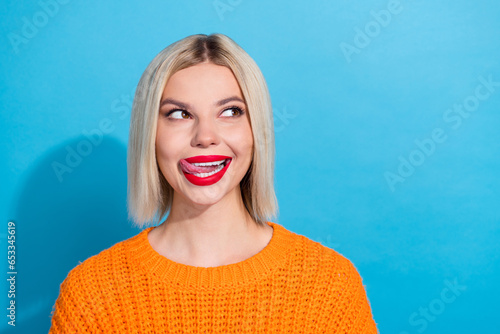 Photos Portrait of pretty woman with bob hairstyle dressed knitwear sweater tongue lick