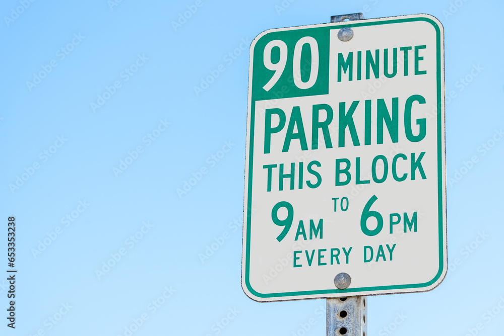 Close up of a parking sign along a street in a city centre. Copy space.