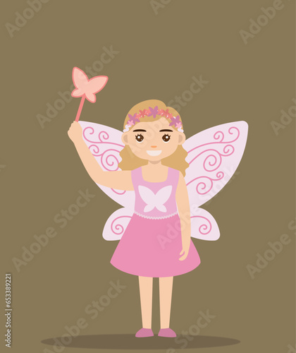 фотографія cute girl in fairy costume with wings at halloween party