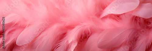 Beautiful colorful background of pink flamingo feathers  exotic tropical bird feather banner
