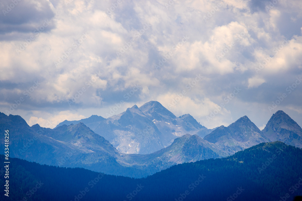 A view of the Dolomites and the countryside into Val di Fassa - Timelapse A view of the Dolomites and the countryside into Val di Fassa - Timelapse