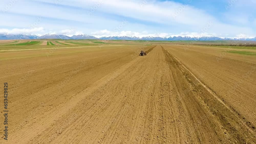 Spring sowing work. Equipment sows wheat Spring sowing work. Equipment sows wheat