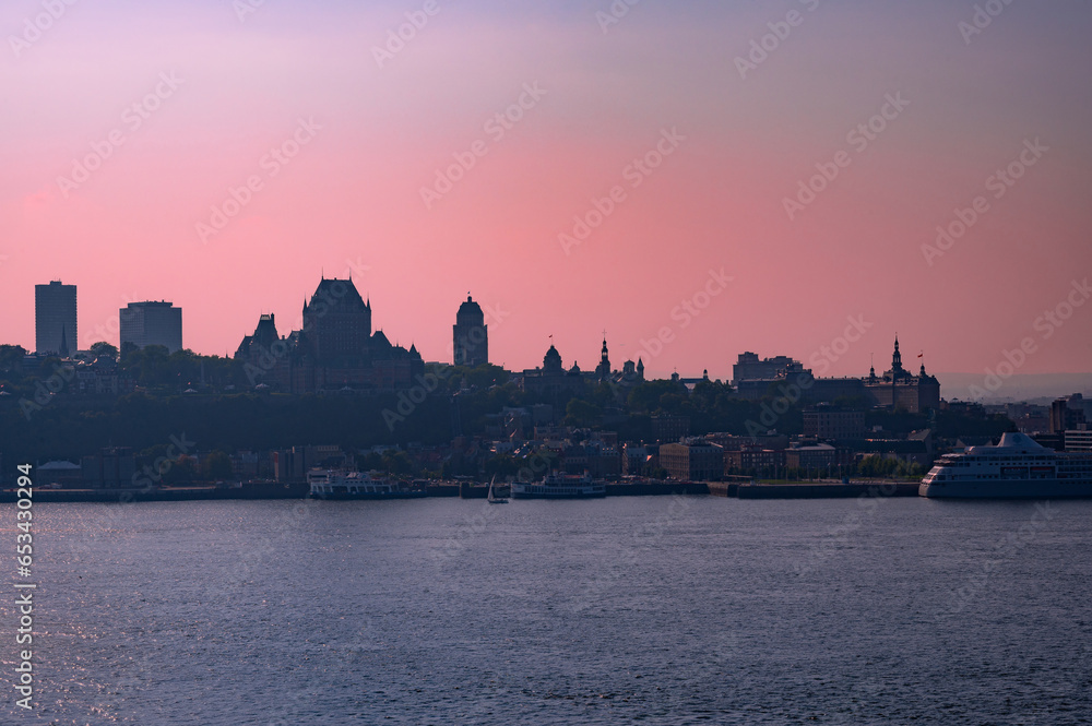 Skyline of Quebec City on a foggy day, Canada. Photo taken from across the Saint Lawrence River in the town of Levis, September 2023.
