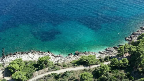 Empty rocky coast in Croatia. Clear green turquoise azure glassy water
