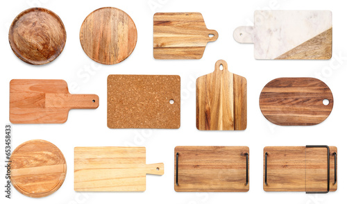 Set of many wooden cutting boards on white background, top view