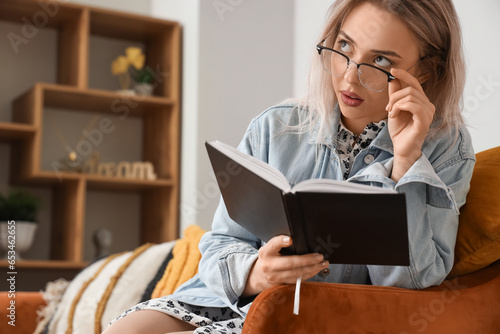 Young woman in stylish eyeg...