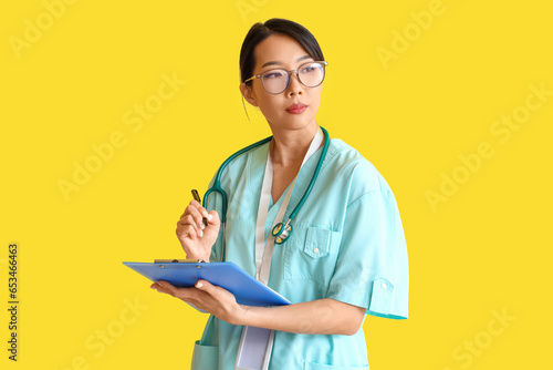 Female Asian medical intern...
