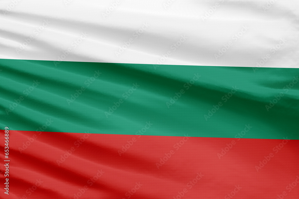 Bulgaria flag is depicted on a sport stitch cloth fabric with folds. Bulgaria flag is depicted on a sport stitch cloth fabric with folds.