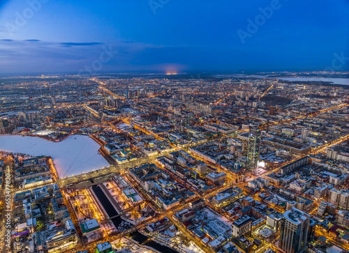 Embankment of the central pond and Plotinka in Yekaterinburg at winter sunset. The historic center of the city of Yekaterinburg, Russia, Aerial View