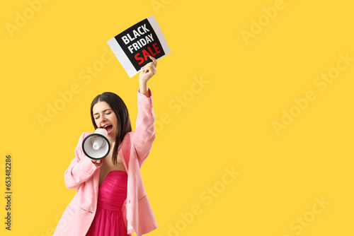 Young woman shouting into m...