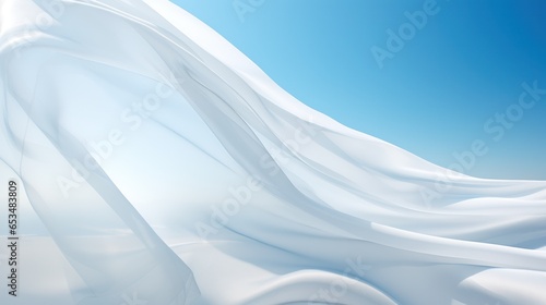 light white fabric flutters in the wind against the blue sky.background. 
