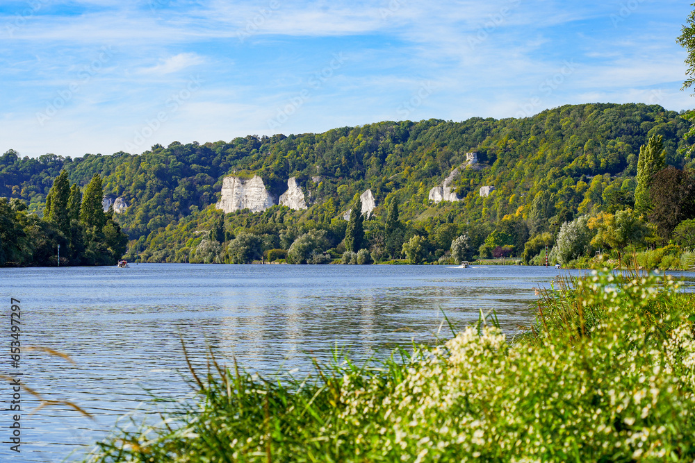 View of the River Seine overlooked by limestone cliffs in Normandy between Paris and Rouen in the town of Les Andelys, France