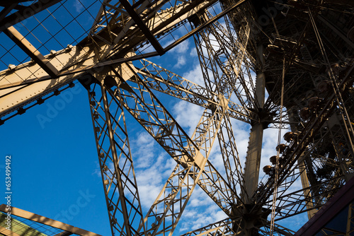 Closeup of metal girders and framing constructions of famous Eiffel Tower in Paris.. photo