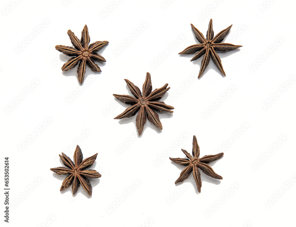 star anise arranged in square shape close up isolated on a white background (spices for cooking cut out) indian cuisine (licorice flavoring seed) curry ingredient - obrazy, fototapety, plakaty 