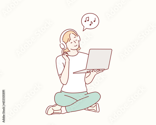 Woman listening to music through headphones. Hand drawn style vector design illustrations.