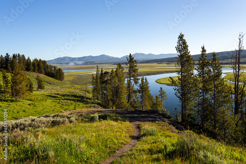 Beautiful river landscape, with a path in the foreground. Top view in summer season. Yellowstone National Park, Wyoming