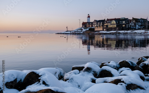 Lighthhouse of Urk Netherlands during sunset in the Netherlands photo