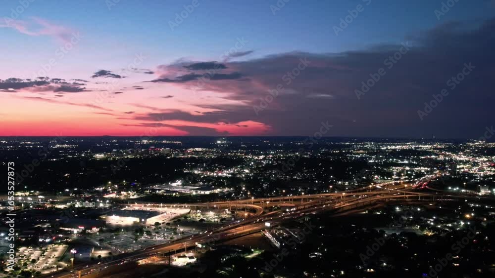 CLOUDY SUNSET DRONE HYPERLAPSE NEXT TO THE EXPRESS WAY AT WEST SAN ANTONIO TEXAS CLOUDY SUNSET DRONE HYPERLAPSE NEXT TO THE EXPRESS WAY AT WEST SAN ANTONIO TEXAS