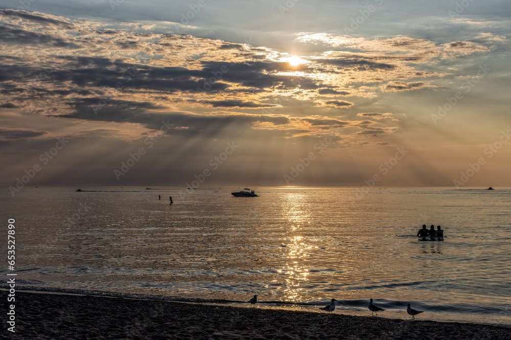 Obraz premium Grand Bend Beach sunset after a hot summer day, Lambton Shores, ON, Canada.