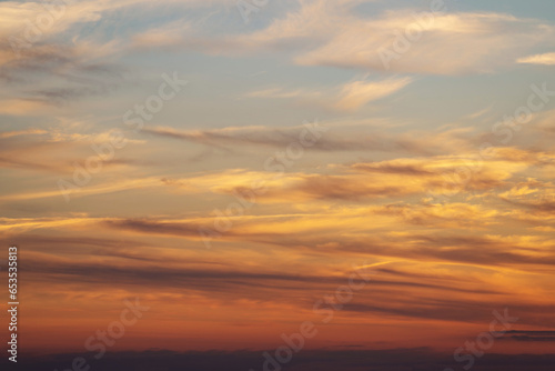 summer evening, sunset in yellow, orange and pink with clouds, background © Елена Челышева