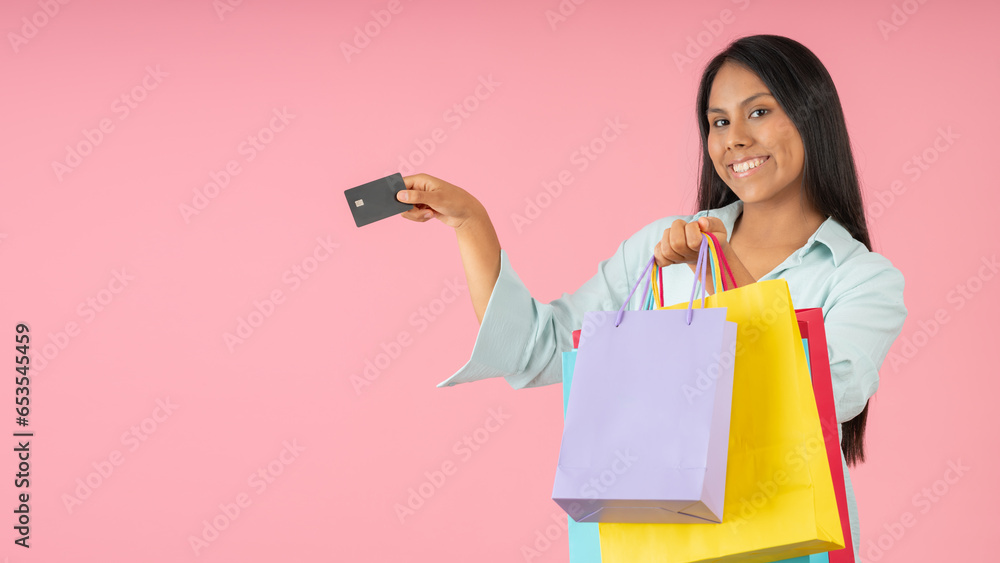 Woman with shopping bags and a credit card Woman with shopping bags and a credit card