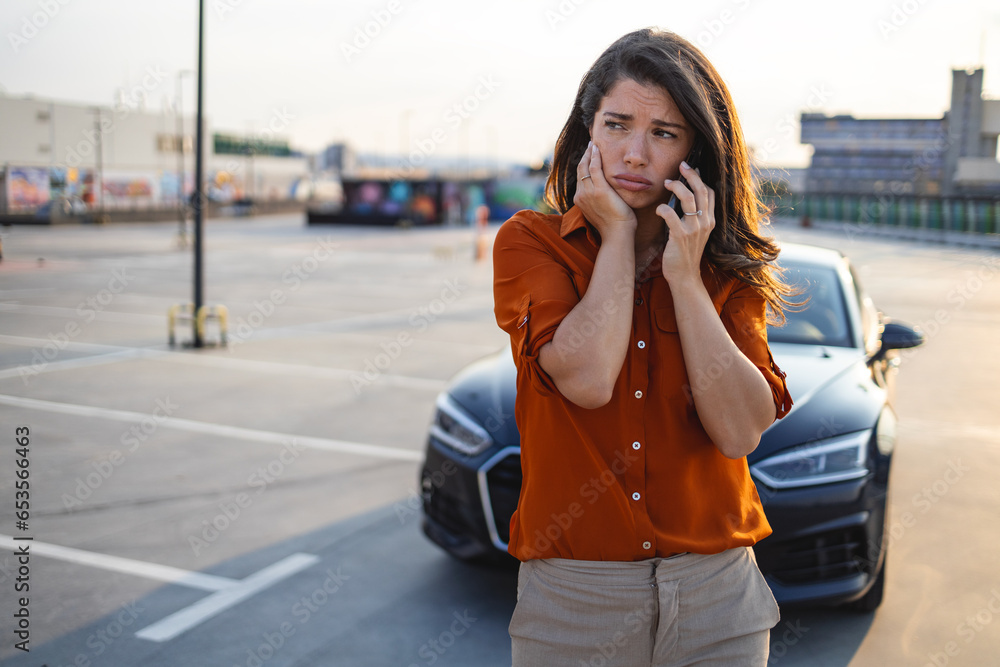 woman driver using mobile phone during problem car. Breakdown or broken car on road. Vehicle Insurance, maintenance and service concept woman driver using mobile phone during problem car. Breakdown or broken car on road. Vehicle Insurance, maintenance and service concept