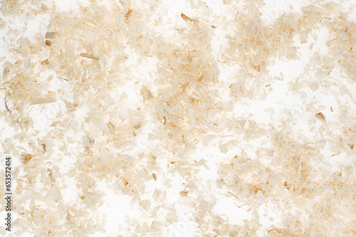 Dry chips sawdust for rodents. wood shavings isolated on white background. filings close up photo