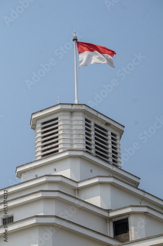 Indonesian Flag, The Red and white Flag, national symbol of Indonesia, Above the Mandiri museum building photo