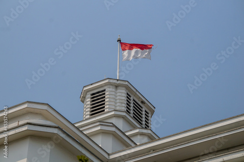 Indonesian Flag, The Red and white Flag, national symbol of Indonesia, Above the Mandiri museum building