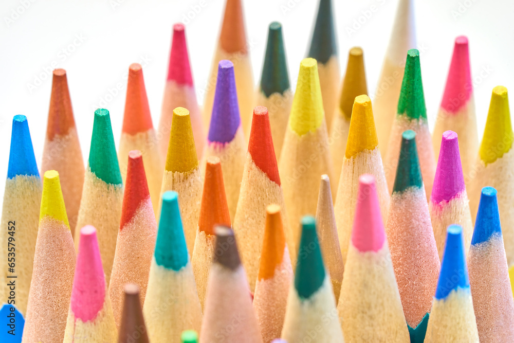 Pen holder full of colorful pencils on isolated background Pen holder full of colorful pencils on isolated background