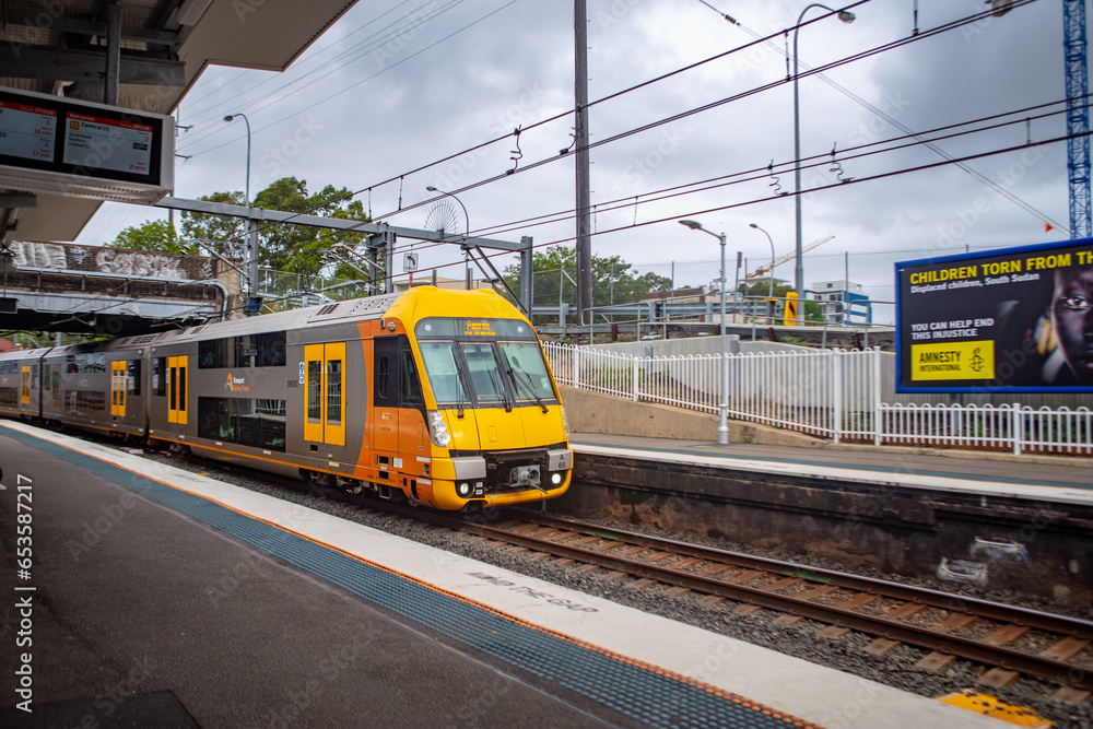 Naklejka premium Sydney/Australia- March 20, 2019: NSW Sydney Train in action, it is the suburban passenger rail network serving the city of Sydney, New South Wales, Australia