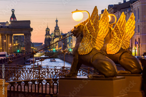 Bank bridge with golden-winged griffons over Griboyedov canal, Saint Petersburg, Russia