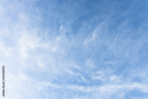 Blue sky and tiny white clouds for background.