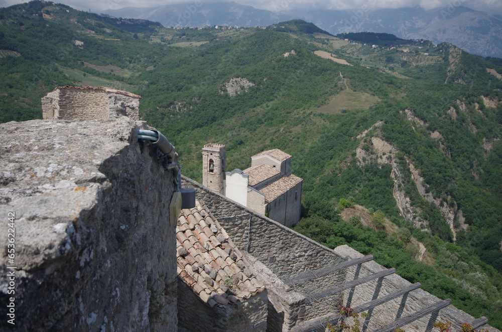 Roccascalegna - Abruzzo - The rocky spur of the castle overlooks some houses of the small village